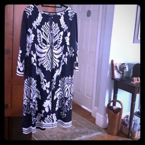 Blue and white dress with 3/4 sleeves.